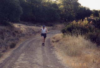 Adam running in the California hills