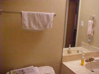 Tom Grey walking down stairs outside Design Computation