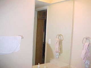 Tom Grey walking down stairs outside Design Computation