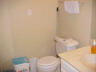 Tom Grey walking down stairs outside Design Computation