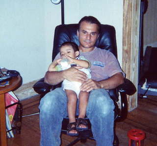 2004-G & I in Papi's chair