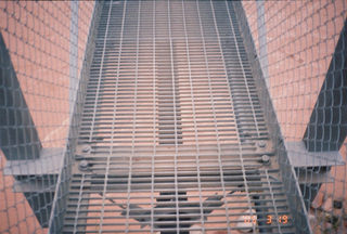 Grand Canyon -- muddy Colorado River through Silver Bridge