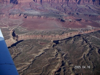 Grand Canyon -- muddy Colorado River through Silver Bridge
