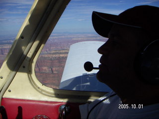Tim Higel in silhouette over my wing over the Grand Canyon!