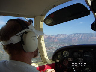 Adam from behind flying over Sedona