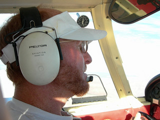 Adam flying with Dick Lind