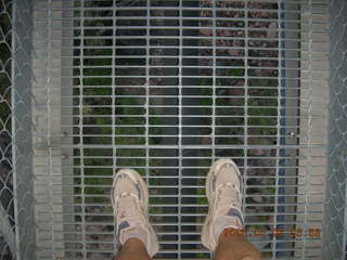 view from Bright Angel trail -- my feet -- looking down through Silver Bridge