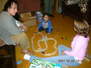 Gaby's fourth birthday -- Ivan, Gaby, Jenny, trains