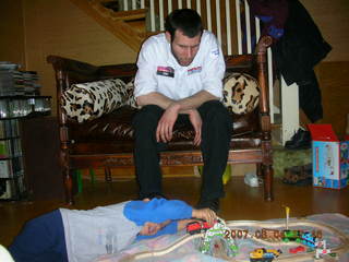 Gaby's fourth birthday -- Eric, Gaby, trains