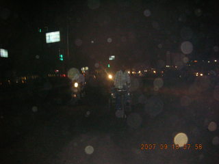 27 69f. Ravi riding a rickshaw in Gurgaon, India (dark)