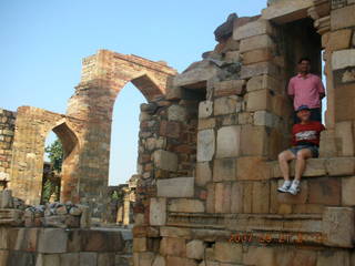 88 69h. Qutub Minar, Delhi - Navneet and Adam in window