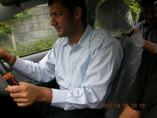 152 69k. Pramod driving his new car