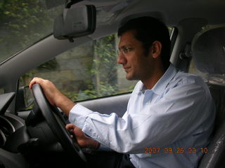 153 69k. Pramod driving his new car