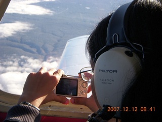 Grand Canyon aerial with clouds - Aditi taking a picture