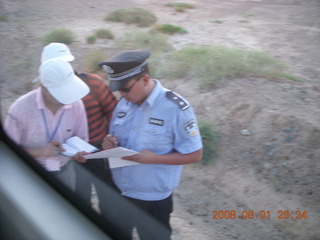 341 6l1. eclipse - Jiayuguan - Gobi Desert - afterward - the police