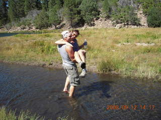 Dustin carrying Marcelle hiking at Pine Valley, Utah