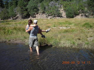 Dustin carrying Marcelle hiking at Pine Valley, Utah