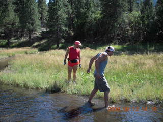 Dustin crossing river - hiking at Pine Valley, Utah