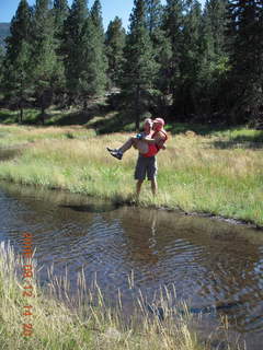 Dustin carrying Marcelle hiking at Pine Valley, Utah