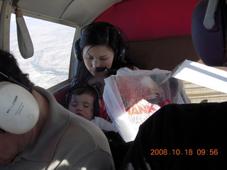 Abigail and Jane asleep flying in N4372J