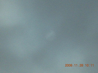 76 6pu. Arches National Park - sun behind clouds