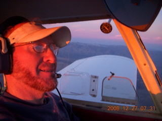 Adam flying N4372J at sunrise