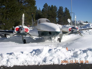 cold snowy road near Flagstaff Airport (FLG)