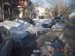 chairs in snow-shoveled parking spaces in Philadelphia