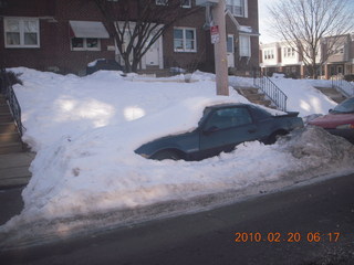 snow-covered parked car in Philadelphia