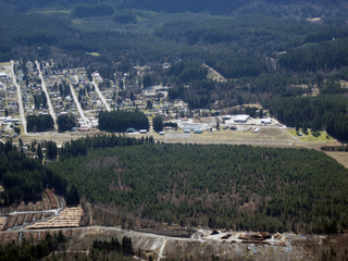 Bill and Eileen on stage with piano