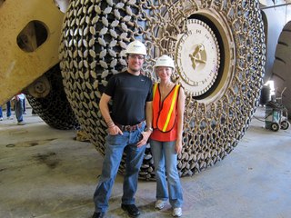 Sean's picture - Bagdad mine tour - Sean and Kristina and big chained tire