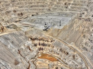 Sean's picture - Bagdad mine tour - Adam, Sean, Kristina, and big, chained tire