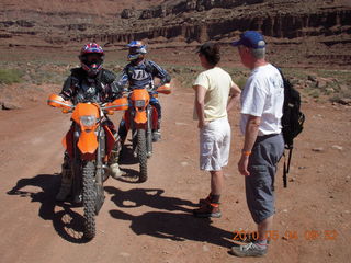 92 774. Canyonlands Lathrop Trail hike - people on white rim road