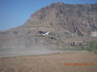 Superior Airport - another airplane, a Maule, taking off