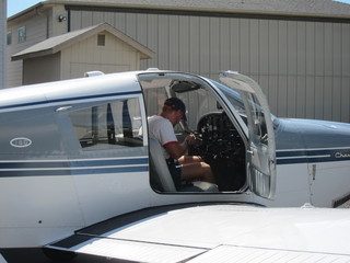 Bob and N8377W and Adam in Watkins hangar