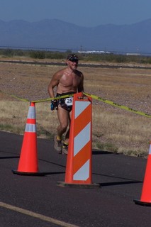 8 7cw. Safford fly-in and half marathon - Ken's photo - Adam running, finishing