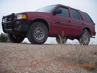 25 7j8. dirt road drive to Anticline Overlook - Rodeo seen from below - looks tough