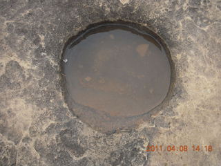 214 7j8. Canyonlands Needles Pothole Point hike - wet pothole