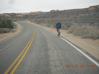 136 7j9. Arches National Park drive - bicyclist