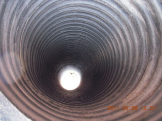 166 7j9. artsy picture of big hose on ground