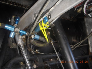 25 7ja. N8377W under instrument panel - cylinder temp gauge and controls chain tangle