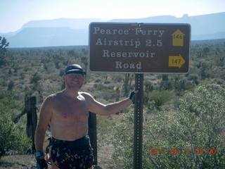 aerial - Pearce Ferry airstrip (L25) run - Adam and sign