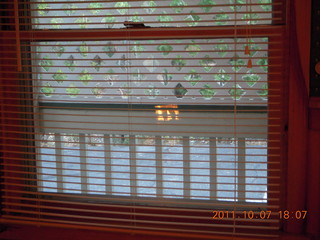 48 7q7. Big Bear City - Cathy's Cottage - fireplace reflected in window