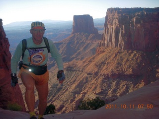 47 7qb. Canyonlands National Park - Lathrop trail hike - Adam hiking (tripod)