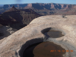 80 7qc. Dead Horse Point hike - Rim View - potholes
