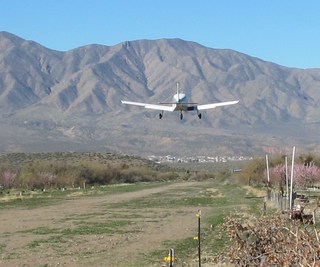 N8377W taking off at Bouquet Ranch