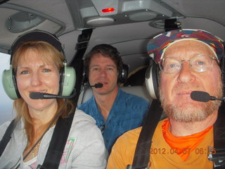 half of Jerry and Carolyn and Adam flying in N8377W