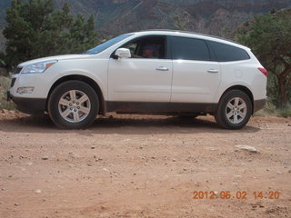 214 7x2. Onion Creek drive - Adam in rental car (tripod)