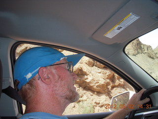 219 7x2. Onion Creek drive - Adam driving rental car