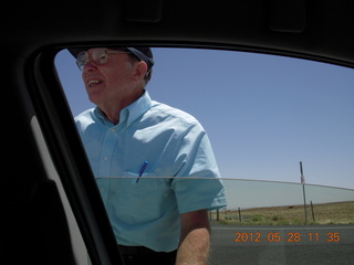 open-cockpit biplane running up at Chandler (CHD)